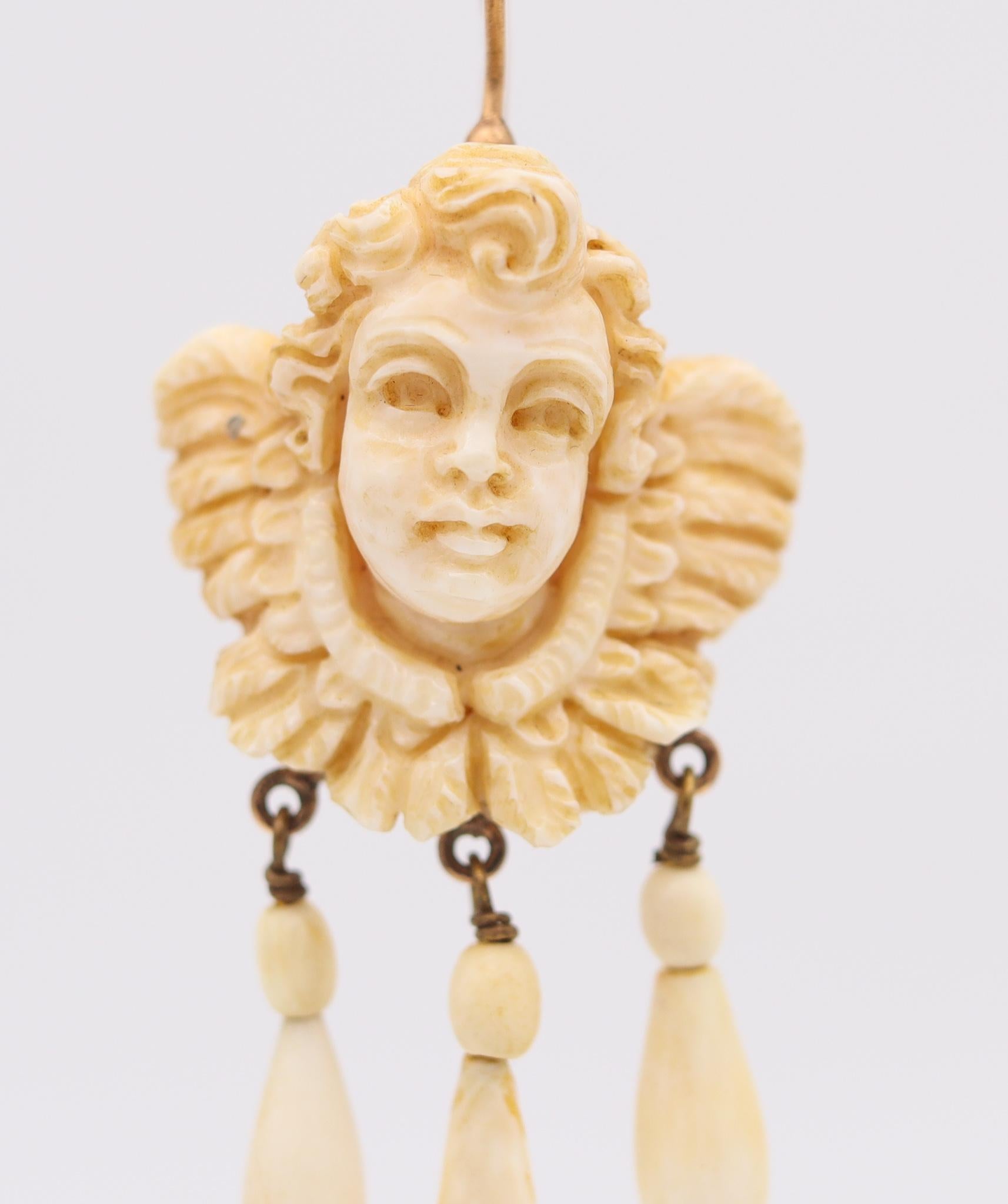 George IV French 1820 Pair of Dangle Drop Earrings in 18Kt Gold with Cherubs Carvings For Sale
