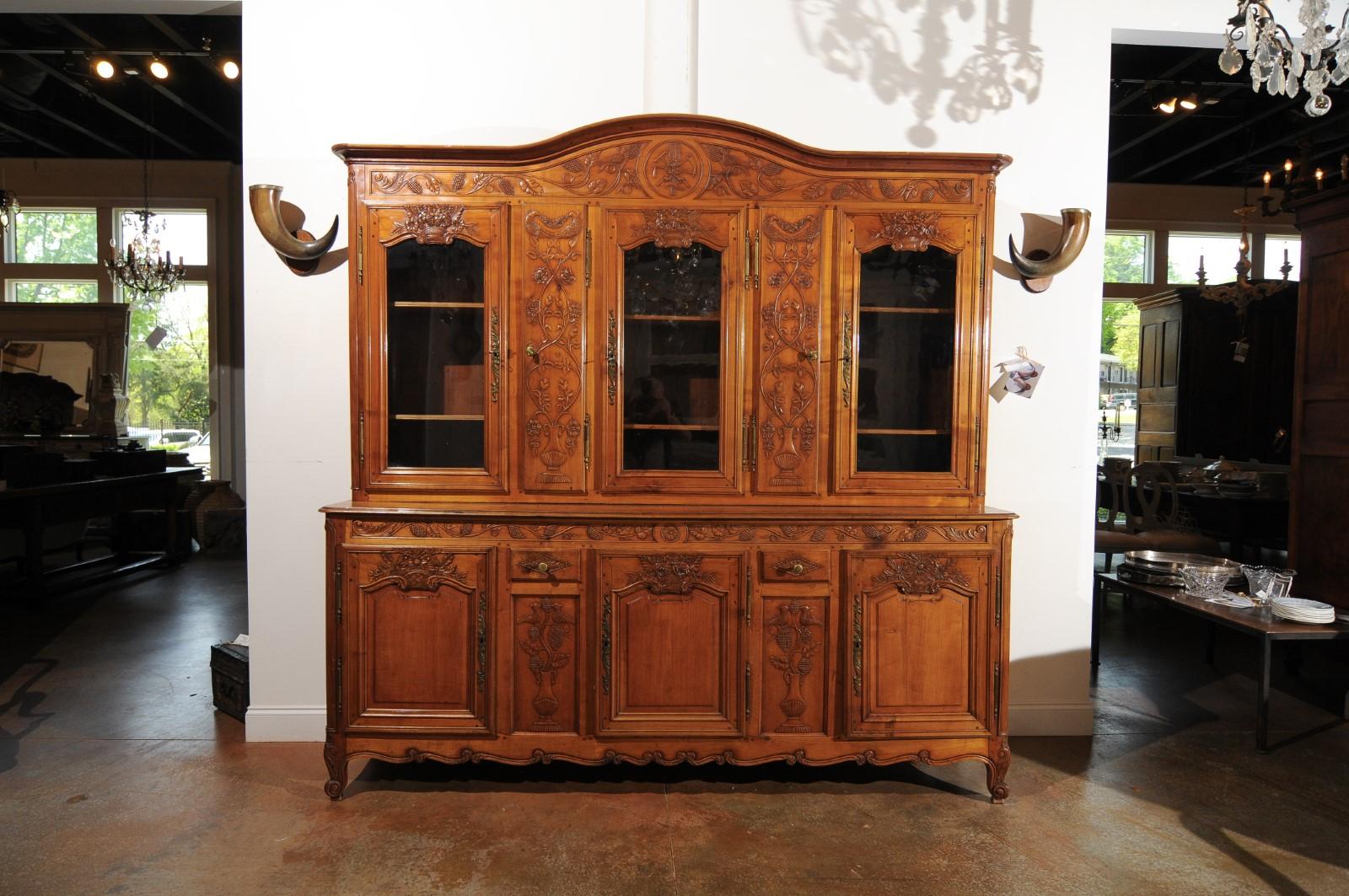 19th Century French 1820s Carved Walnut Vitrine with Glass Doors, Hidden Panels and Drawers For Sale