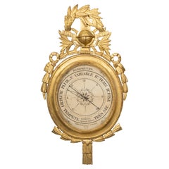 Baromètre en bois doré sculpté signé Gohin, datant de la période de la restauration des années 1820