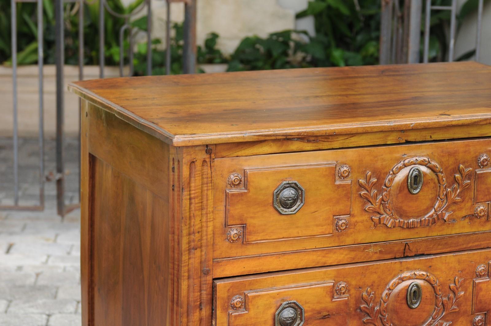 19th Century French 1820s Restauration Period Walnut Three-Drawer Commode with Carved Foliage For Sale