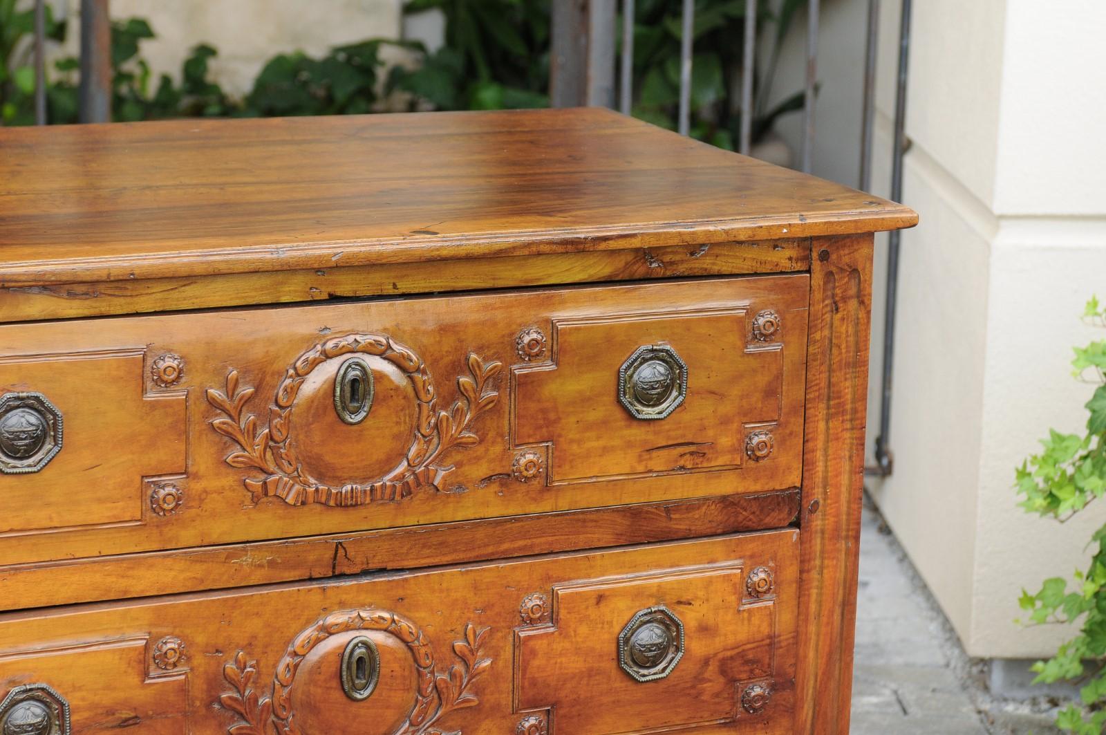 Metal French 1820s Restauration Period Walnut Three-Drawer Commode with Carved Foliage For Sale