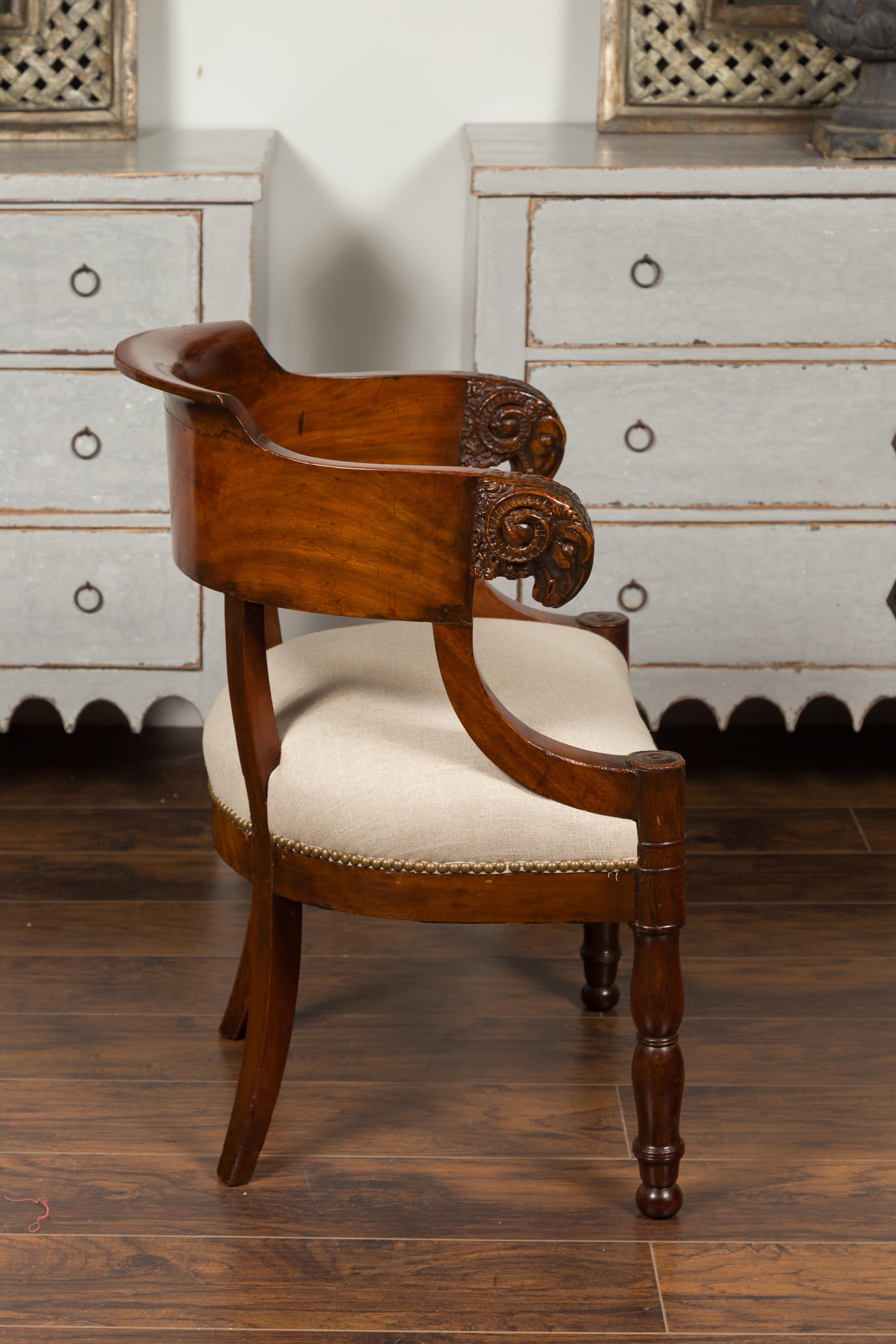 Upholstery French 1830s Restauration Period Mahogany Armchair with Carved Rams' Heads For Sale