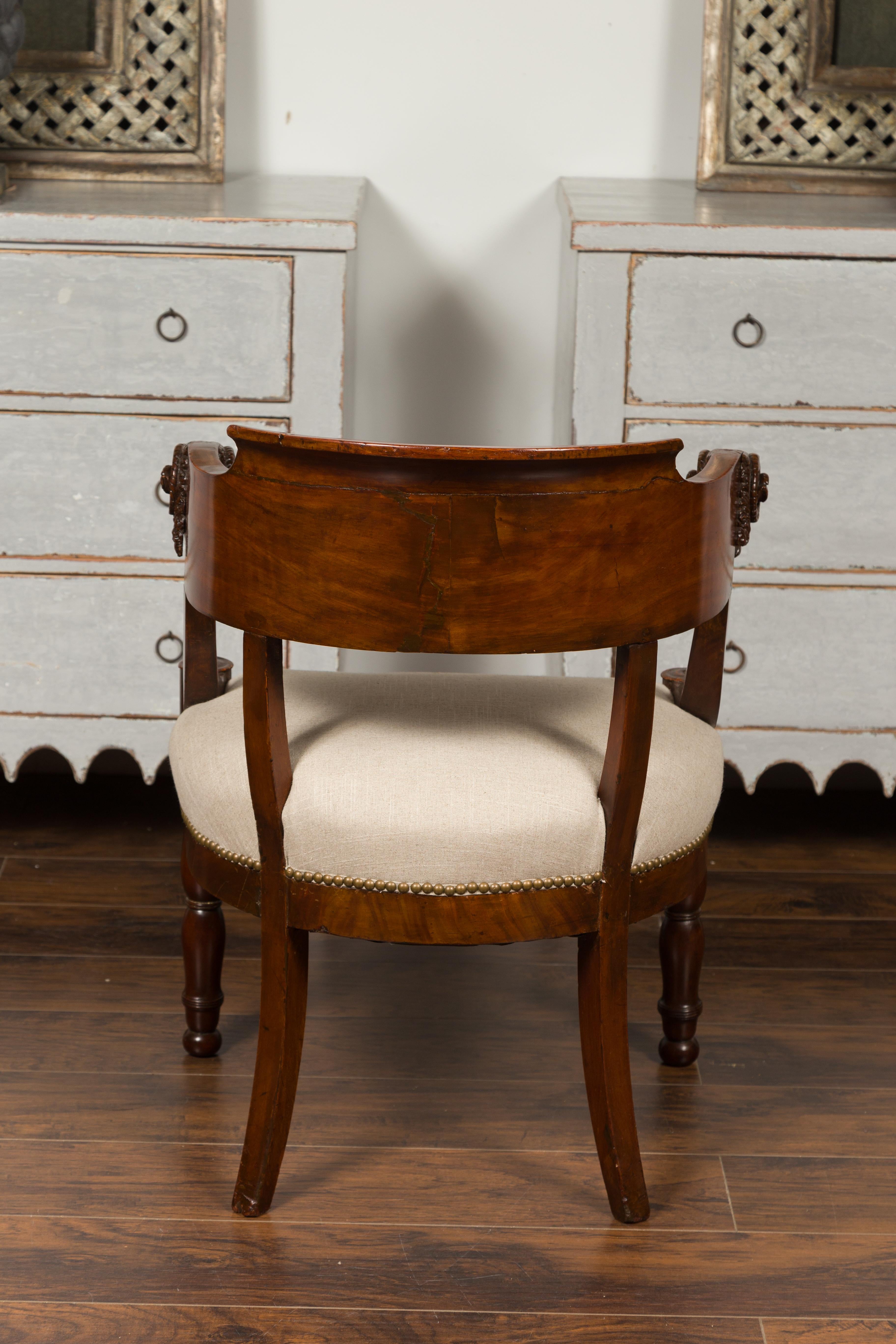 French 1830s Restauration Period Mahogany Armchair with Carved Rams' Heads For Sale 1