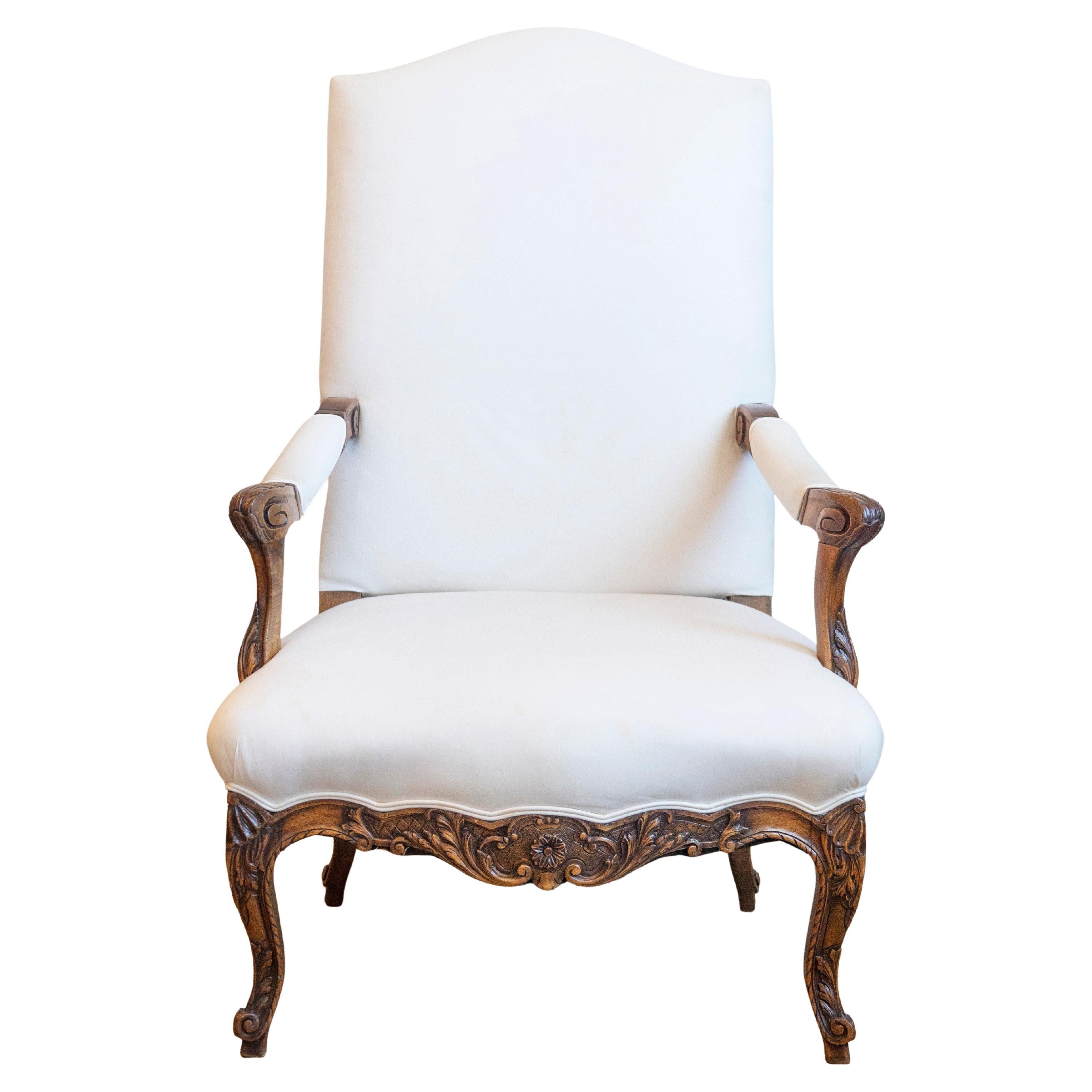 French 1840s Louis XV Style Walnut Fauteuil with Carved Accents and Upholstery