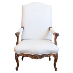 French 1840s Louis XV Style Walnut Fauteuil with Carved Accents and Upholstery