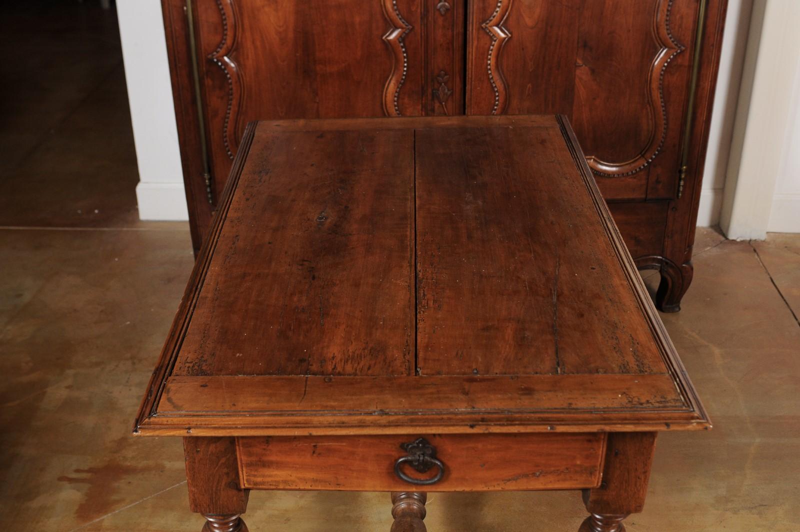 19th Century French 1850s Louis XIII Style Cherry Table with Lateral Drawer and Turned Legs For Sale