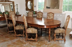 French 1850s Napoleon III Period Oval Walnut Extension Table with Four Leaves