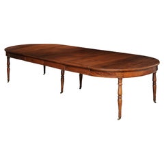 French 1850s Napoleon III Period Oval Walnut Extension Table with Four Leaves