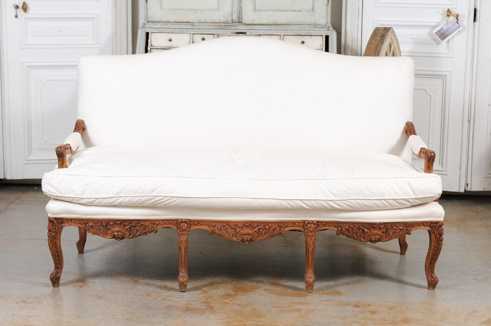 French 1850s Régence Style Three-Seat Canapé with Carved Shells and Upholstery In Good Condition In Atlanta, GA