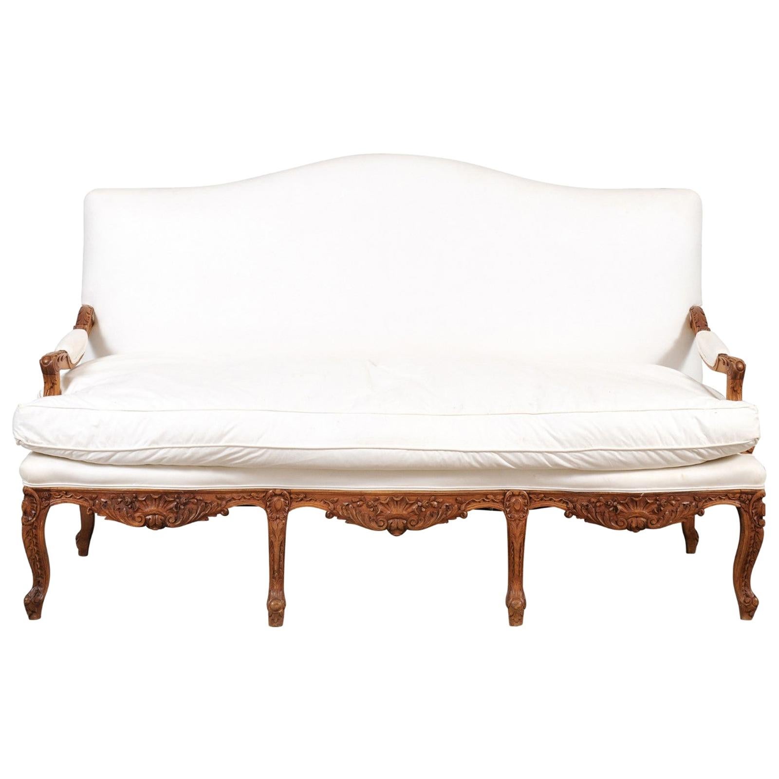 French 1850s Régence Style Three-Seat Canapé with Carved Shells and Upholstery