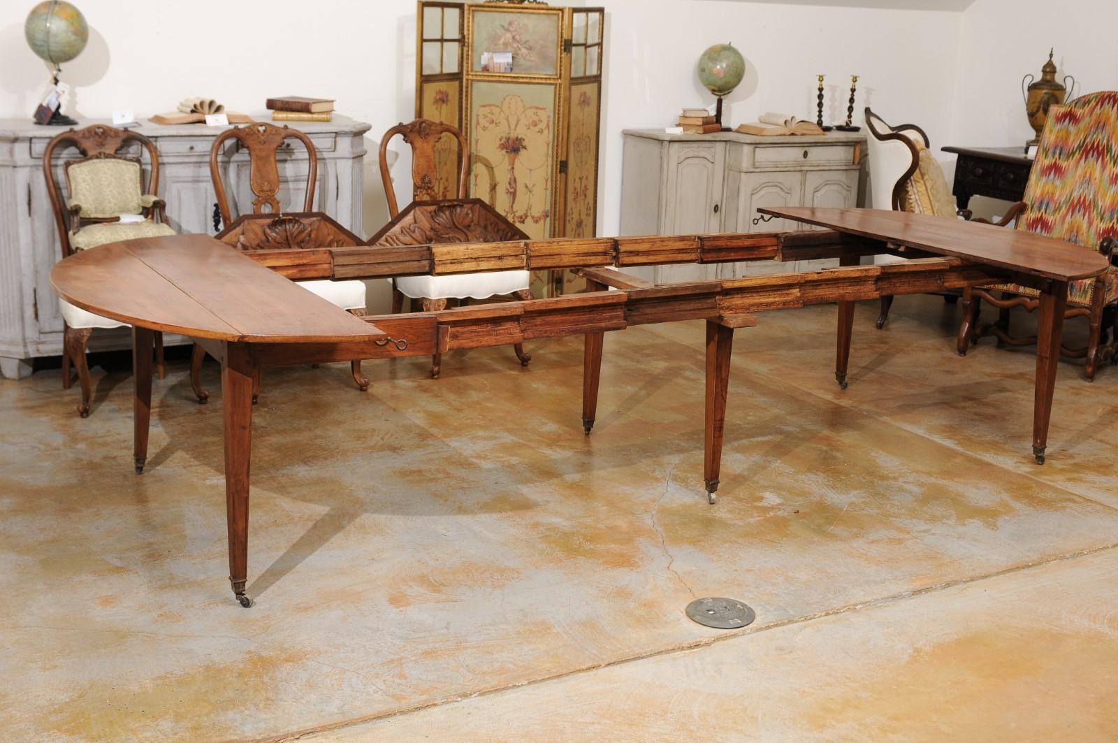 French 1850s Walnut Oval Extension Dining Table with Four Removable Leaves 14