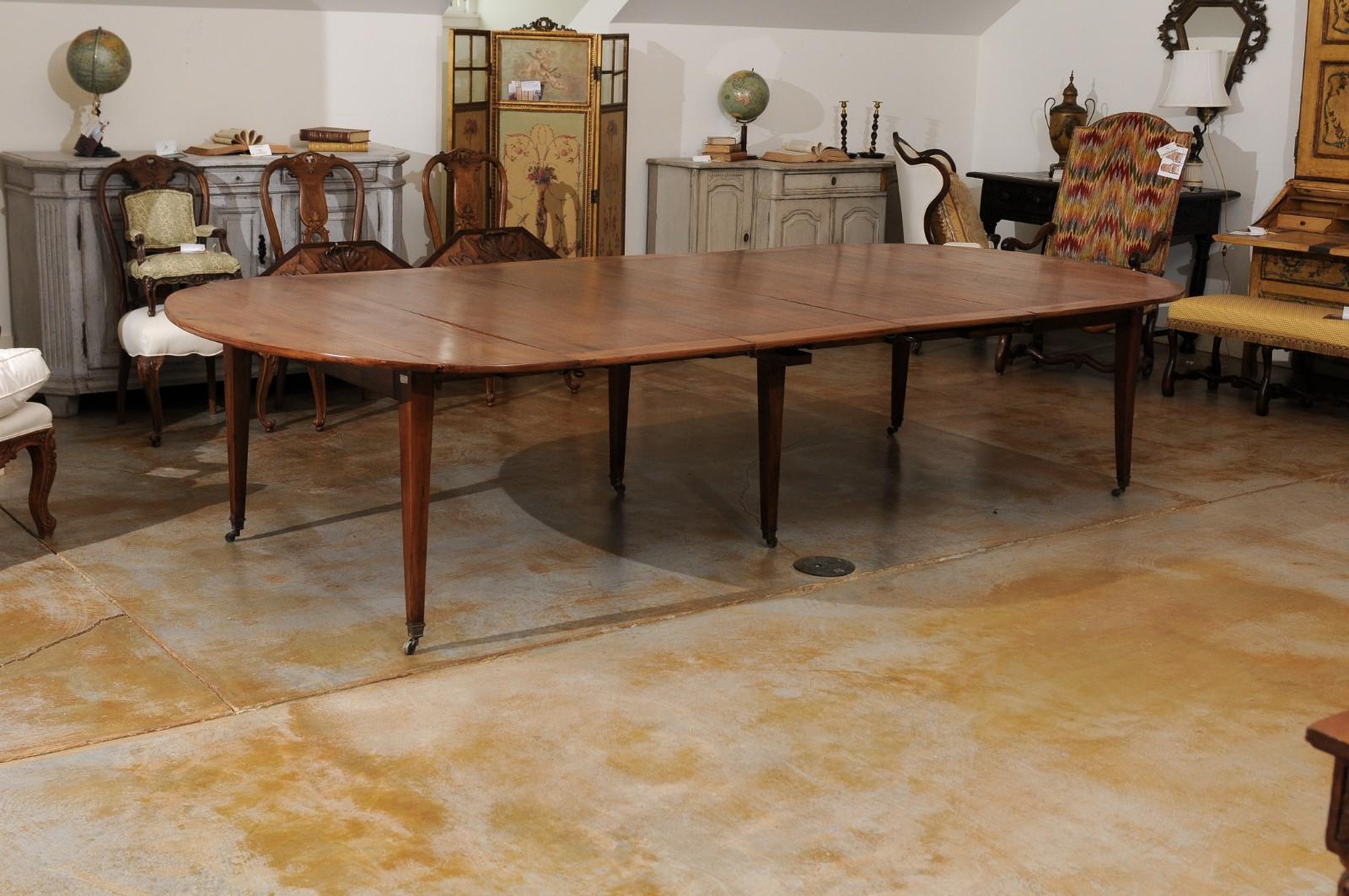 Napoleon III French 1850s Walnut Oval Extension Dining Table with Four Removable Leaves
