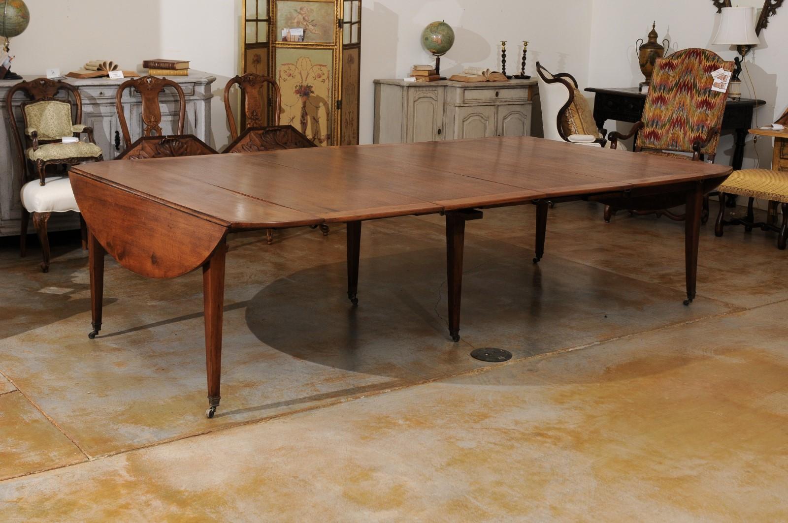 19th Century French 1850s Walnut Oval Extension Dining Table with Four Removable Leaves