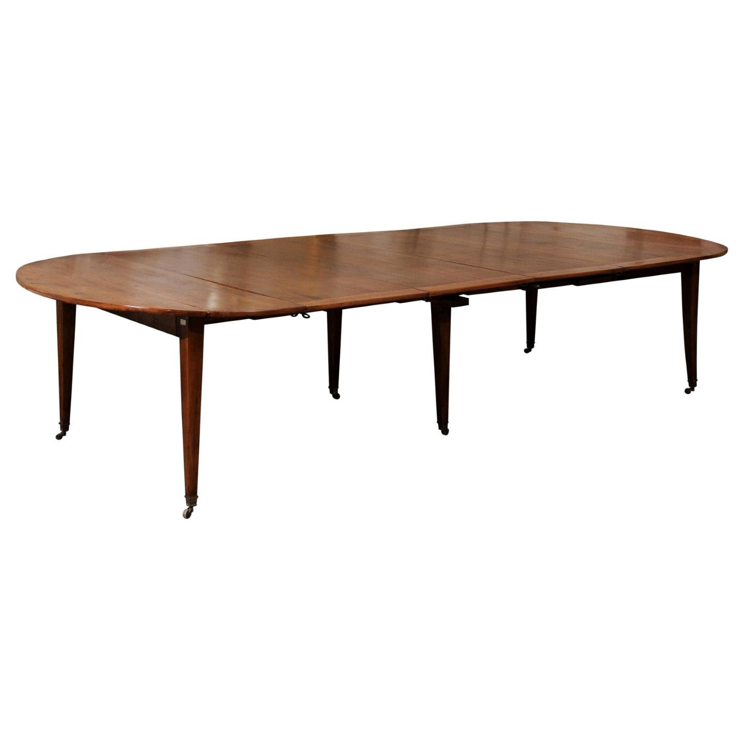 French 1850s Walnut Oval Extension Dining Table with Four Removable Leaves