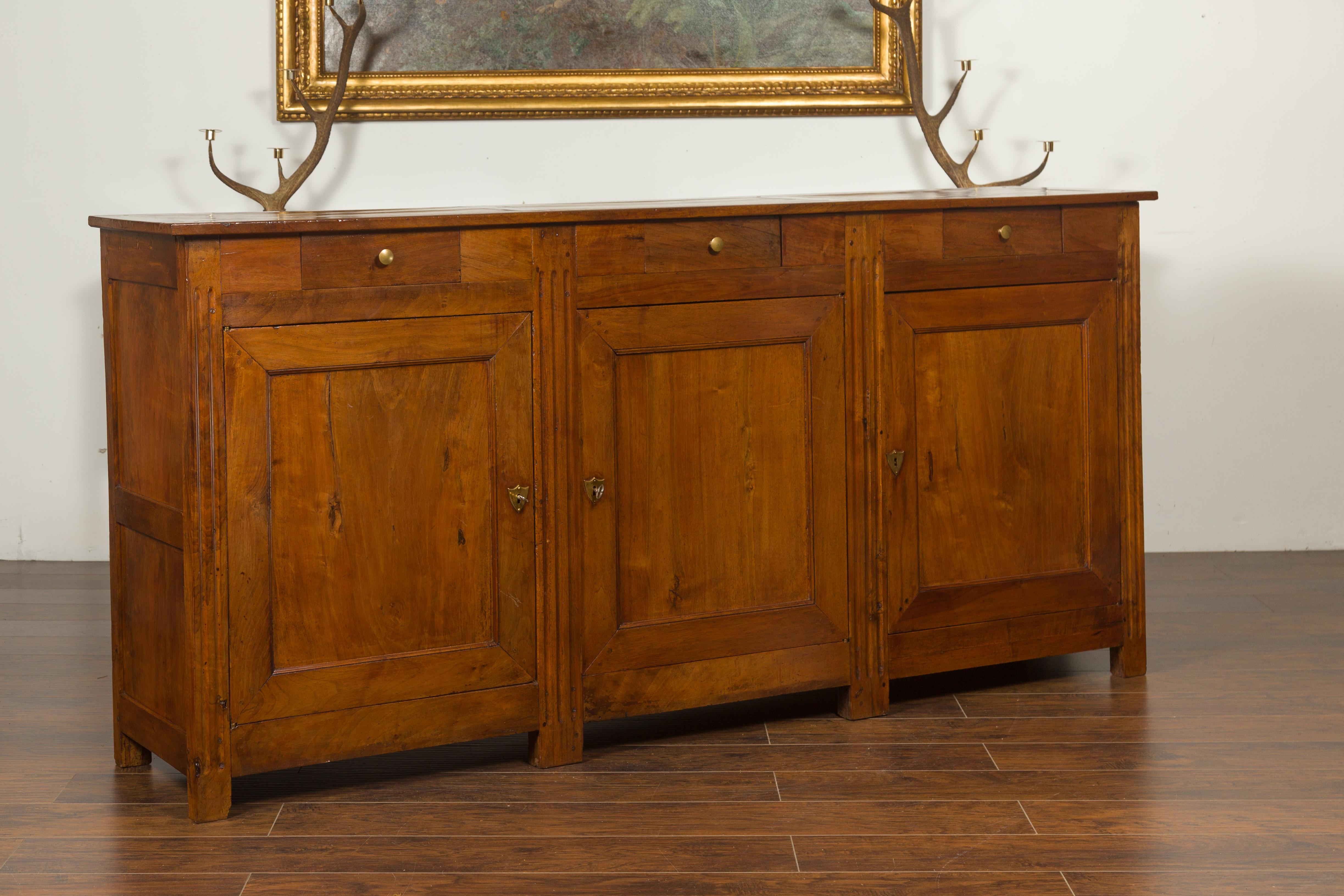 French 1870s Napoleon III Walnut Enfilade with Three Drawers over Three Doors 8