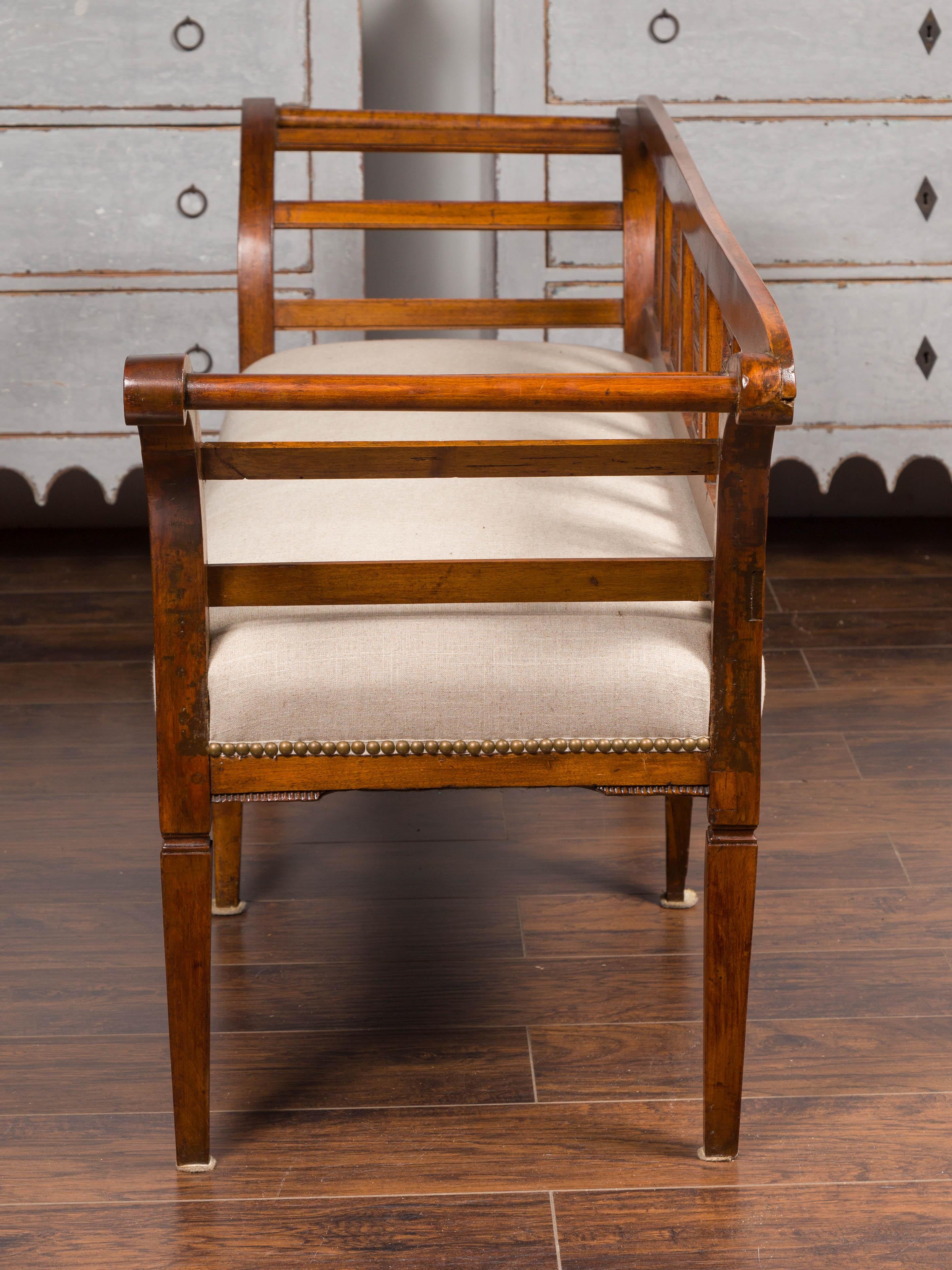 French 1870s Upholstered Fruitwood Settee with Carved Urns and Outscrolling Arms 8