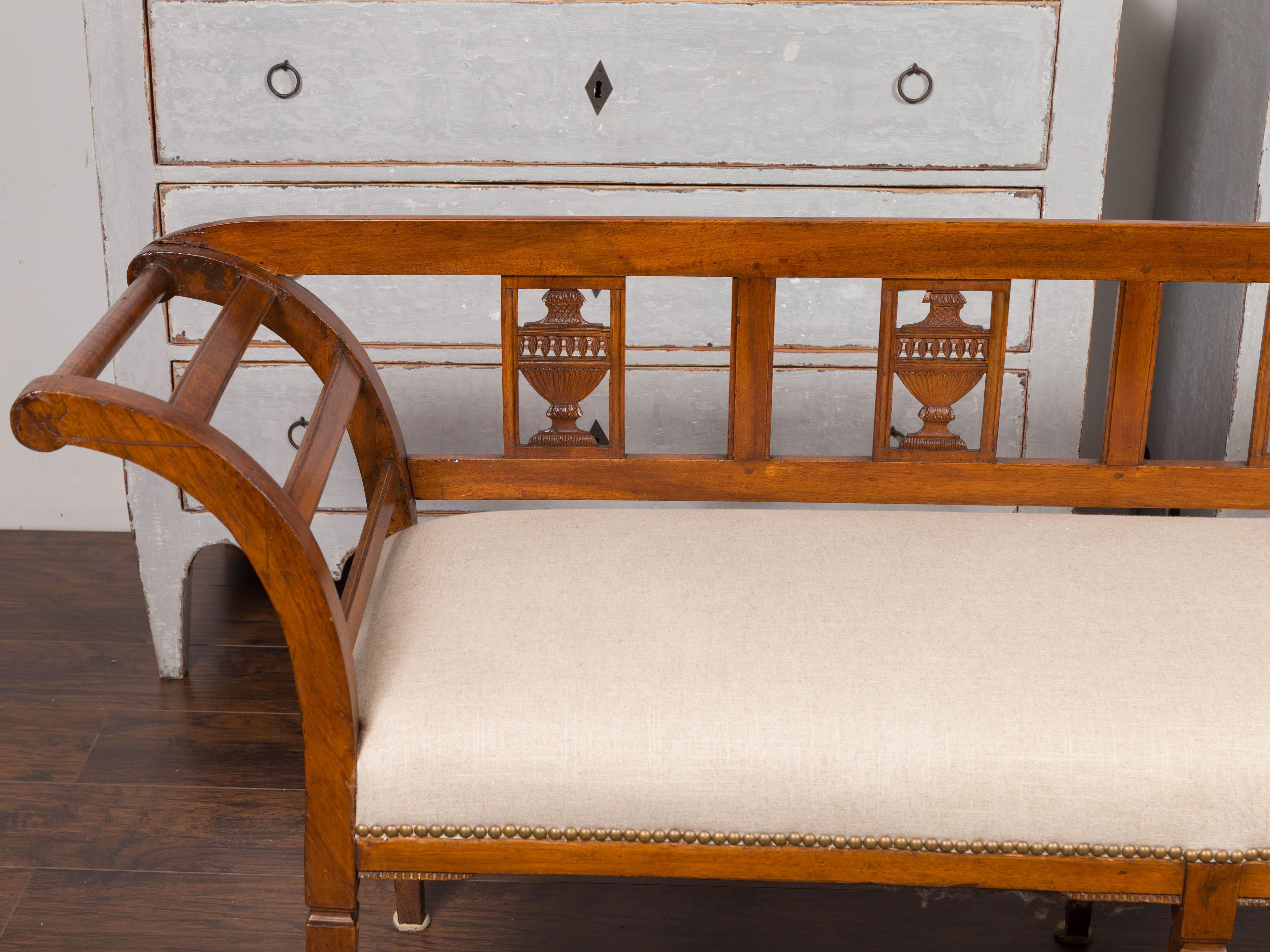 Brass French 1870s Upholstered Fruitwood Settee with Carved Urns and Outscrolling Arms