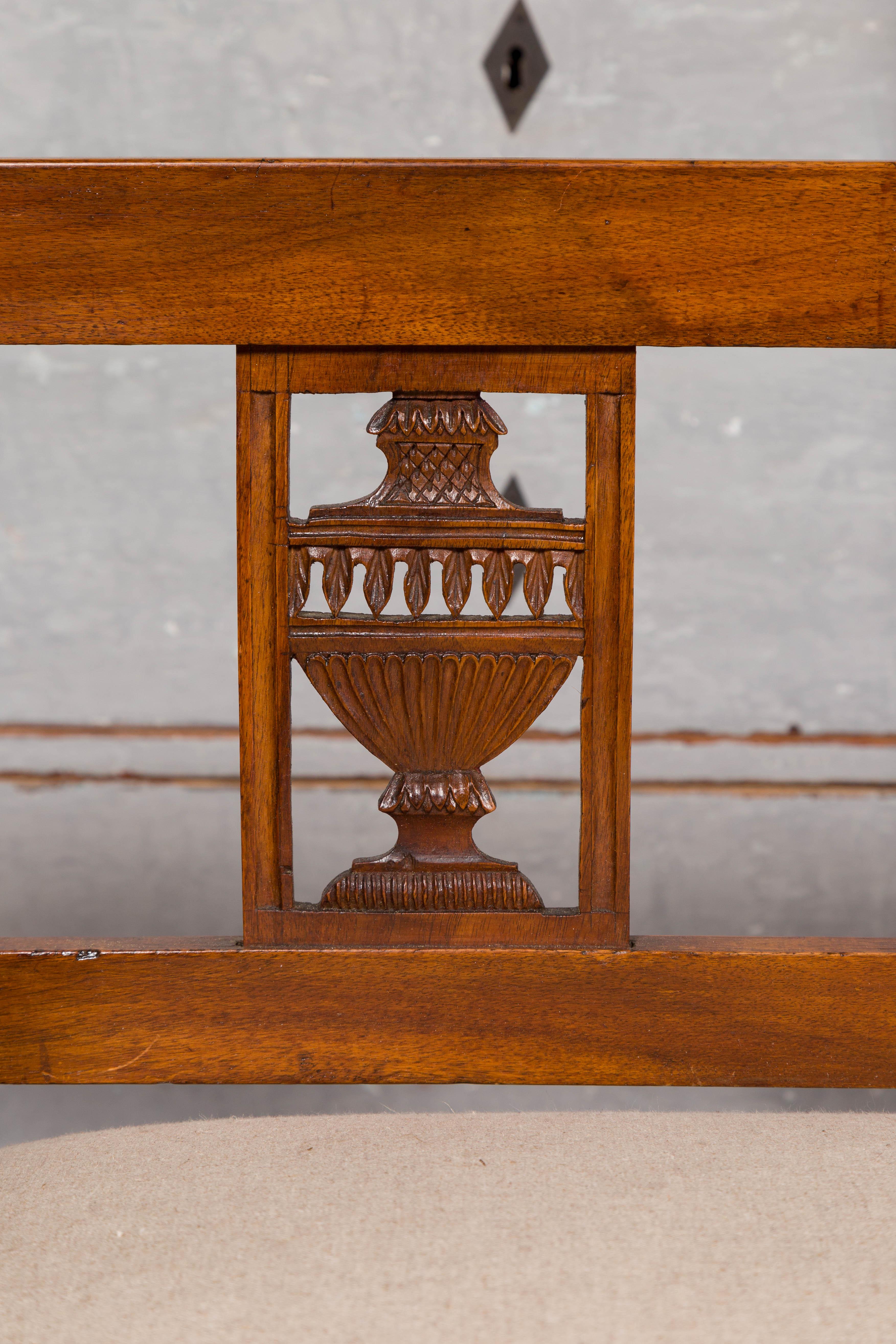 French 1870s Upholstered Fruitwood Settee with Carved Urns and Outscrolling Arms 4