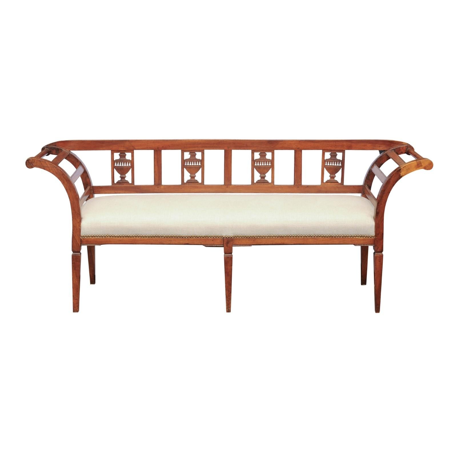 French 1870s Upholstered Fruitwood Settee with Carved Urns and Outscrolling Arms