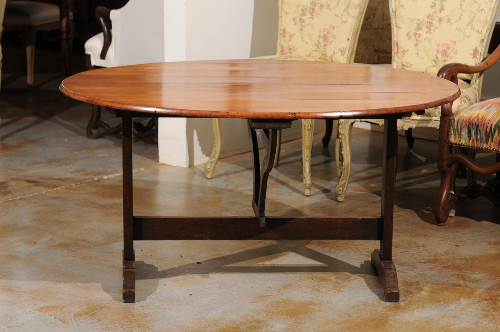 French 1870s Wine Tasting Table with Oval Tilt-Top, Trestle Base and Wedge 4