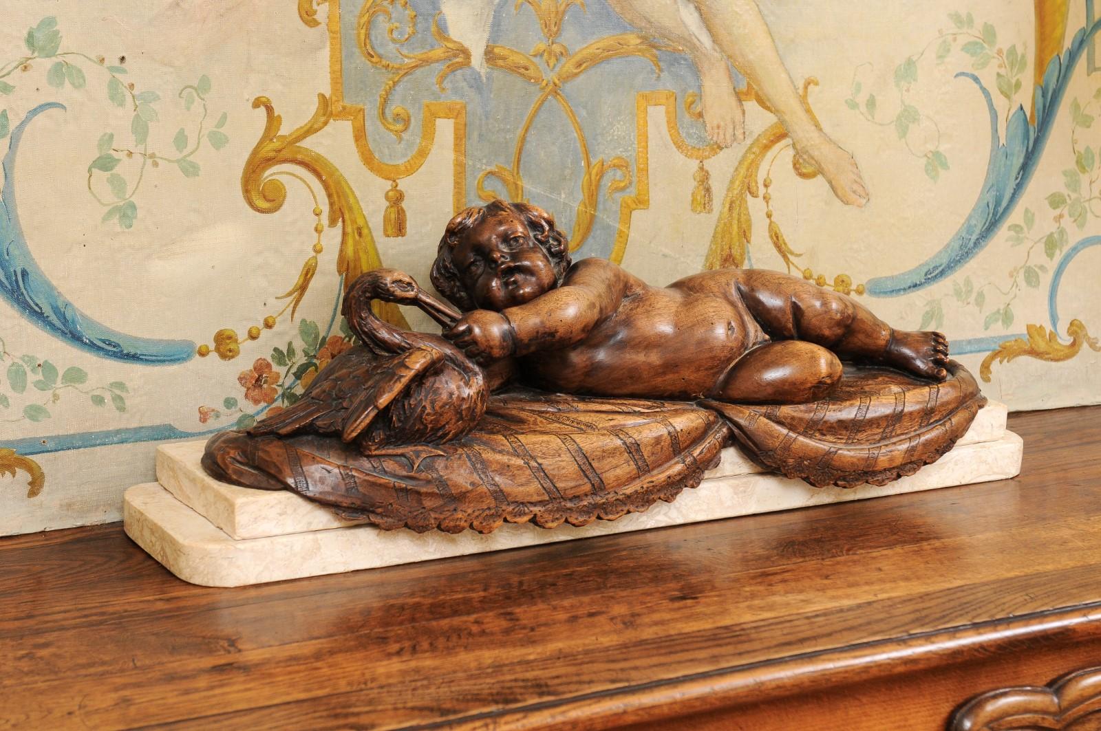 French 1880s Carved Walnut Putto Feeding a Swan Sculpted Group on Marble Base In Good Condition For Sale In Atlanta, GA