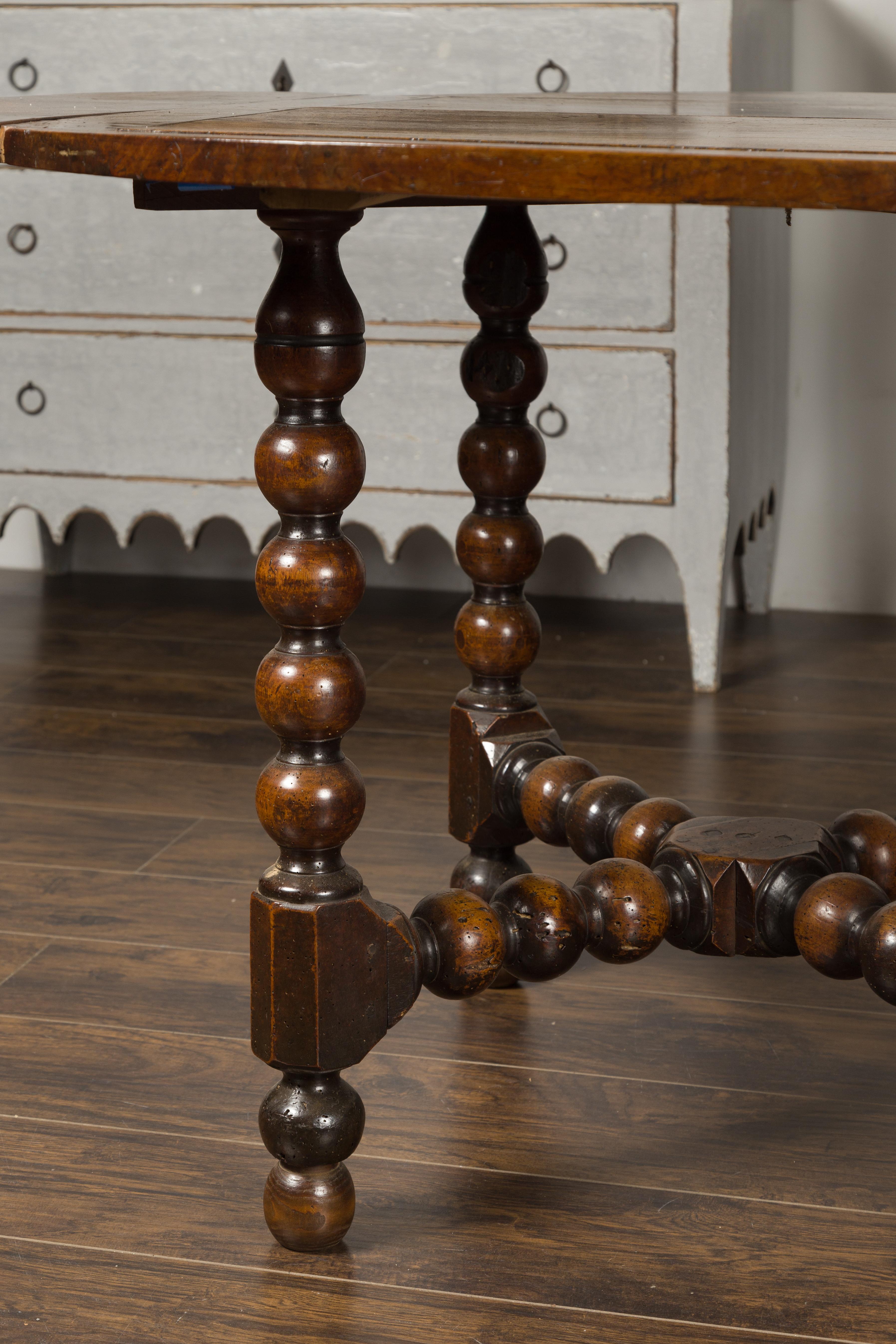 French 1880s Louis XIII Style Walnut Table with Bobbin Legs and Cross Stretcher In Good Condition In Atlanta, GA