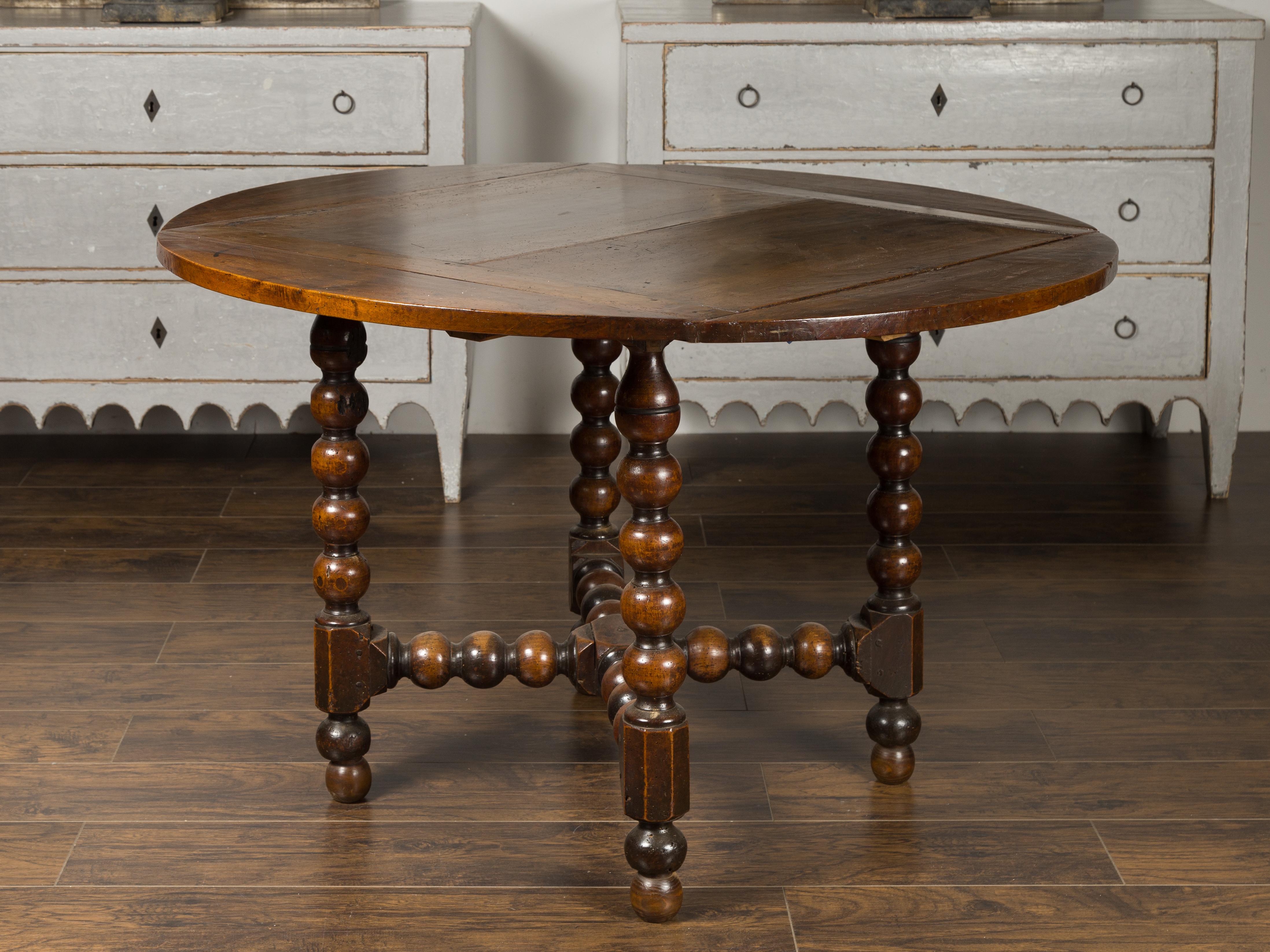 French 1880s Louis XIII Style Walnut Table with Bobbin Legs and Cross Stretcher 1