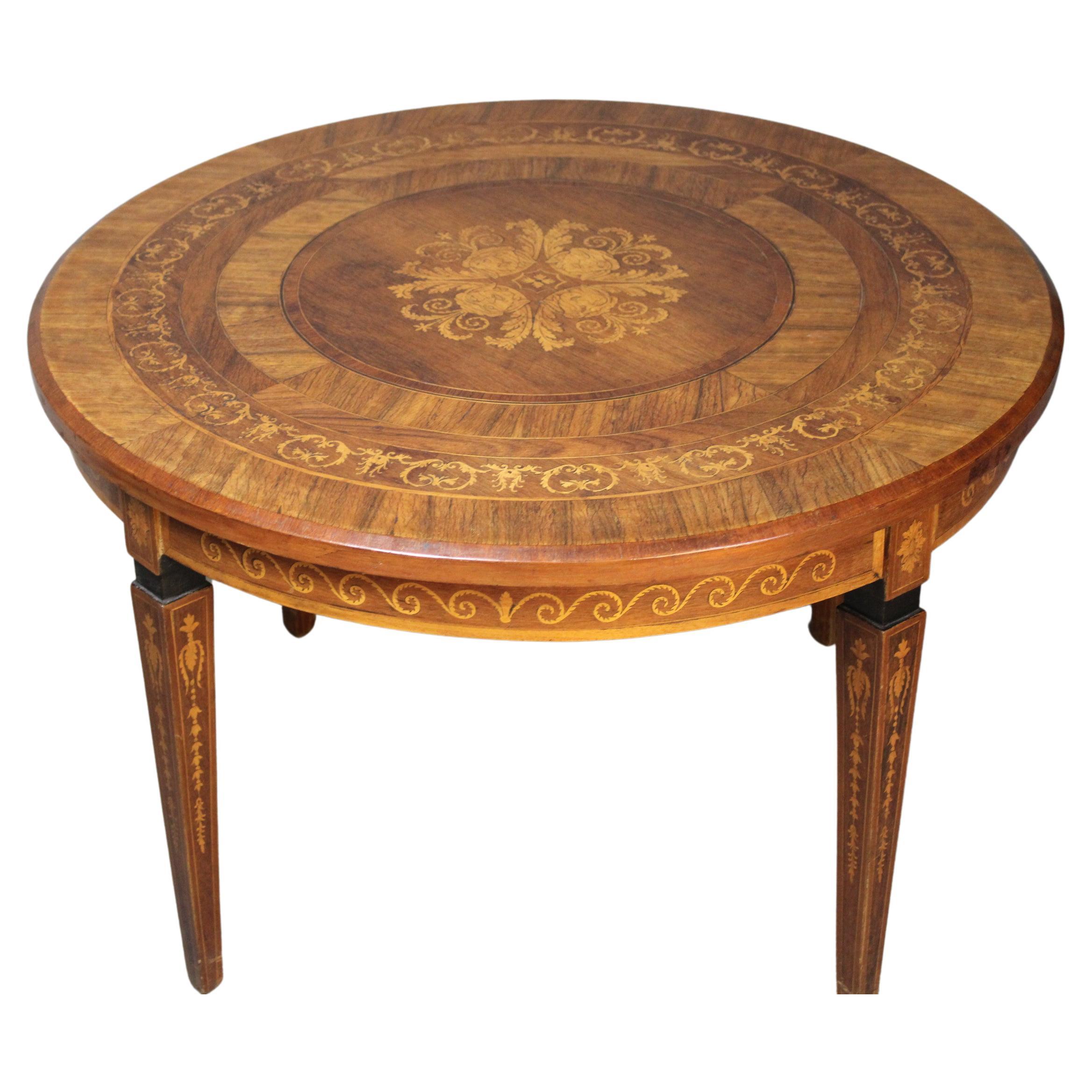 A French 1920 round burl walnut inlaid table in style of Louis XVI
This French center table will bring a distinguished touch to any room, from a foyer to a living room.

 