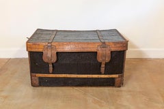 French 1890s Brown and Black Travel Trunk with Leather Straps and Aged Patina