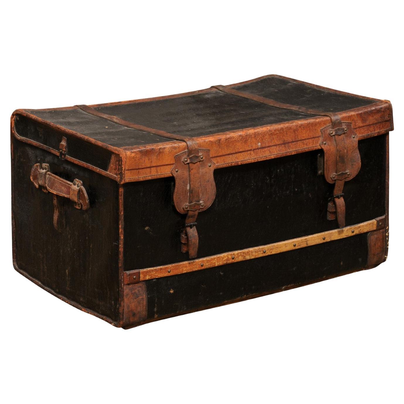 French 1890s Brown and Black Travel Trunk with Leather Straps and Aged Patina