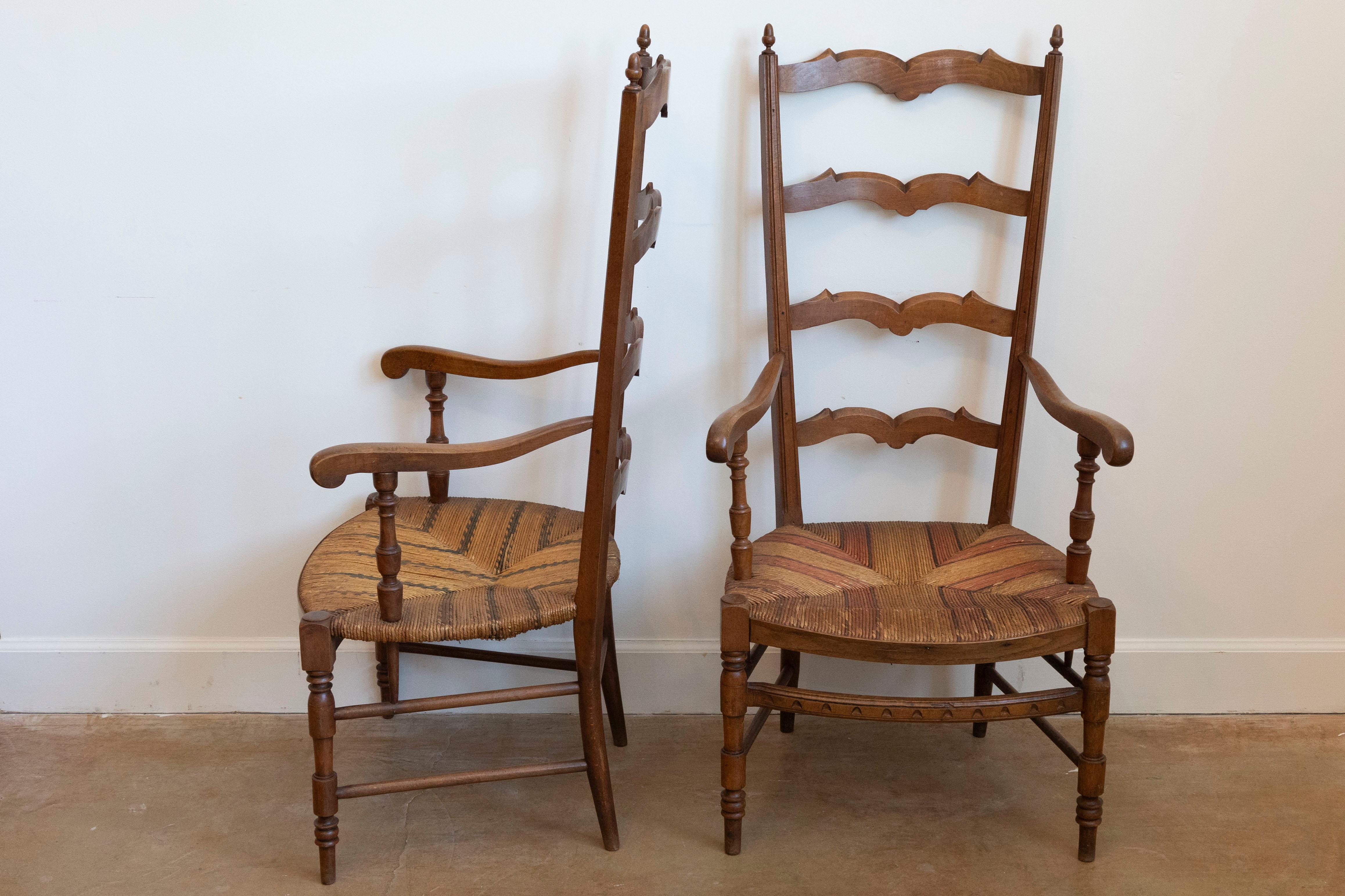 Carved French 1890s Fruitwood Ladder Back Chairs with Straw Seats and Turned Legs For Sale