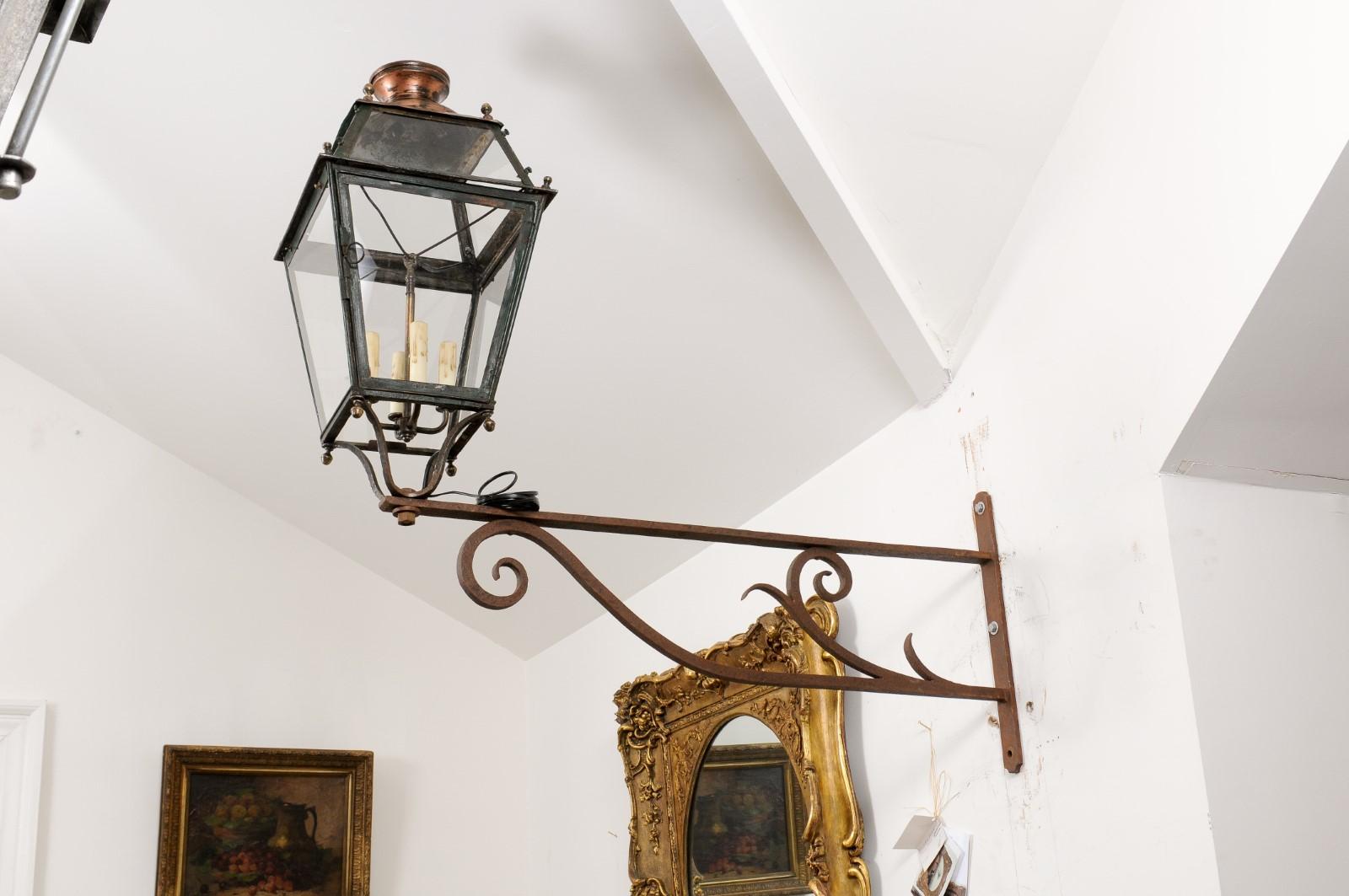 Brass French 1890s Iron and Copper Wall Lantern with Four Lights and Scrolling Bracket For Sale