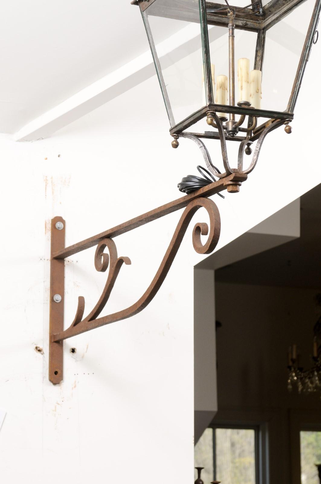 French 1890s Iron and Copper Wall Lantern with Four Lights and Scrolling Bracket For Sale 1
