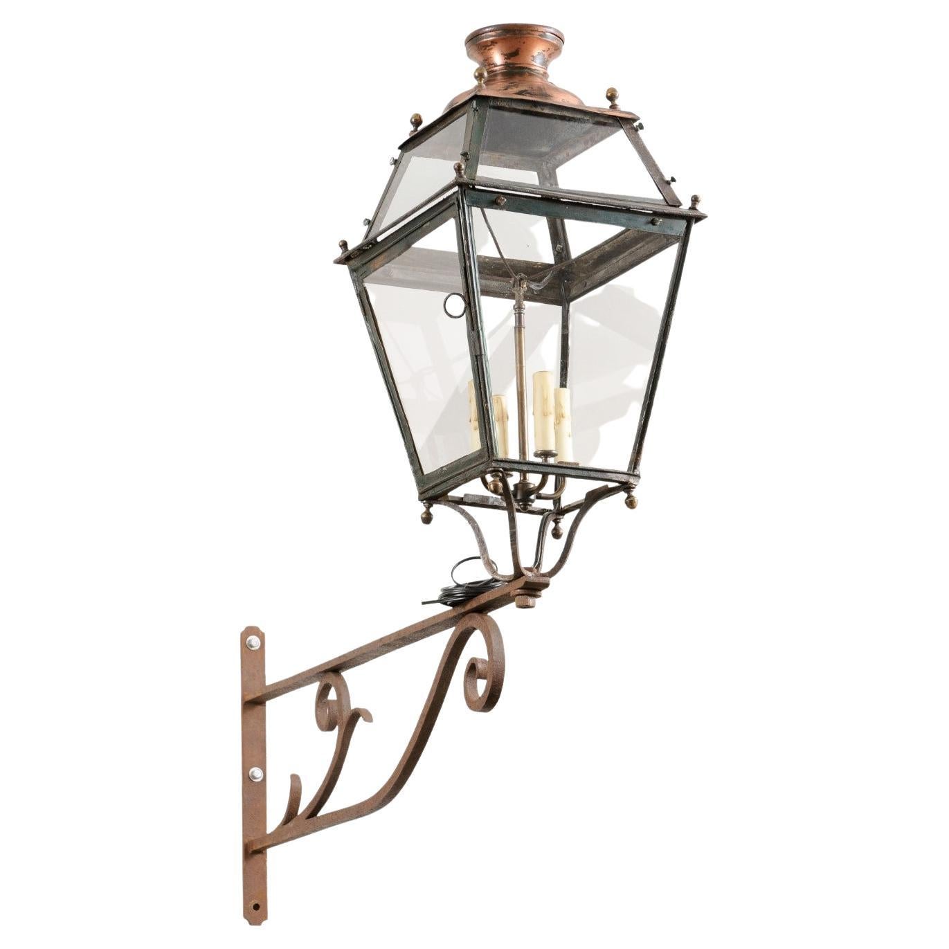 French 1890s Iron and Copper Wall Lantern with Four Lights and Scrolling Bracket For Sale