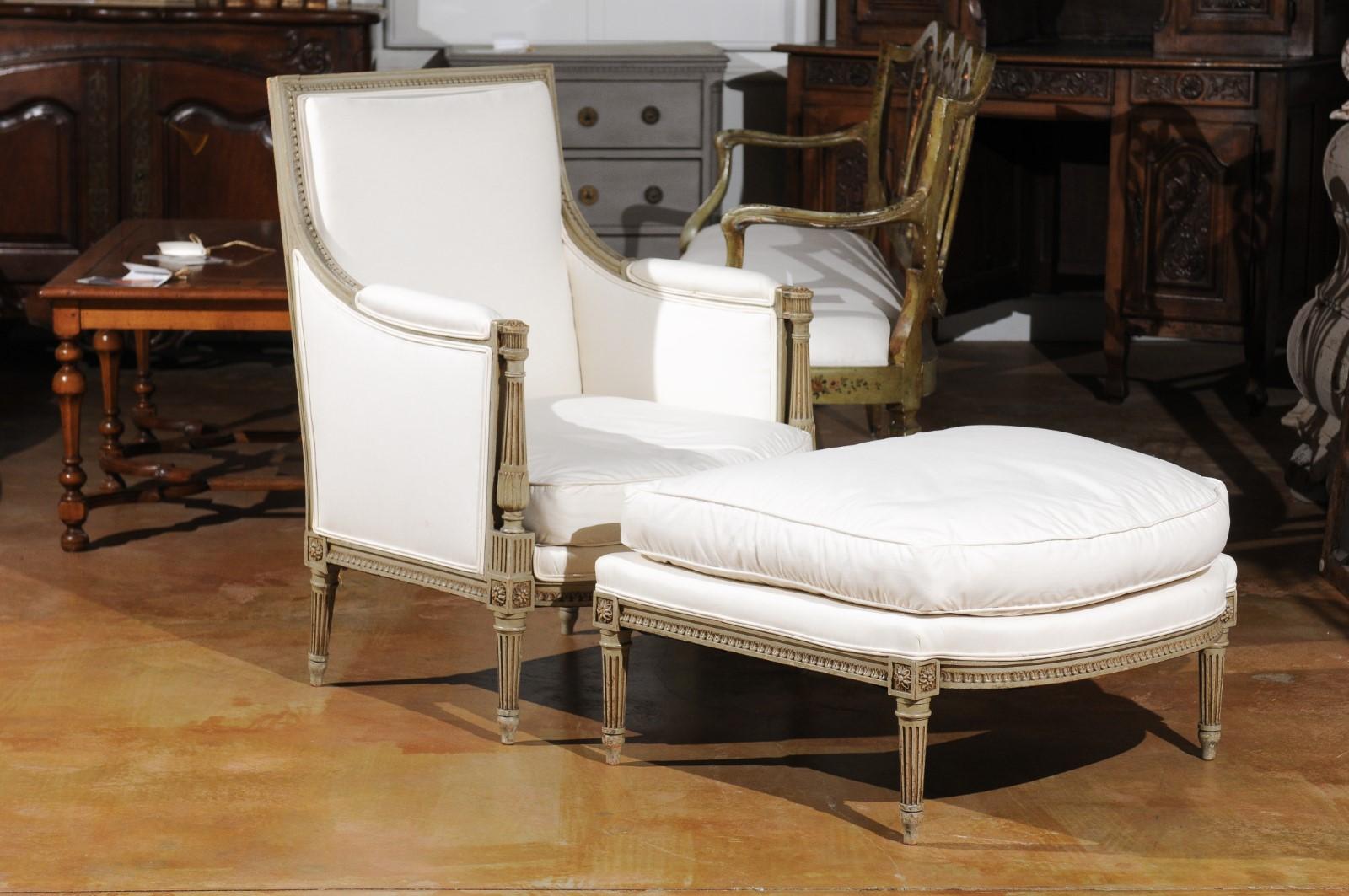 A French Louis XVI style two-part duchesse brisée from the late 19th century, with bergère chair, ottoman and new upholstery. Born in France during the last decade of the 19th century, this duchesse brisée presents the stylistic characteristics of