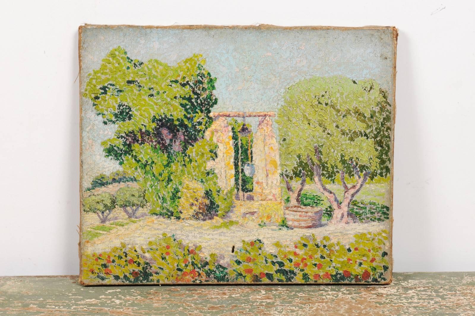 A Southern French oil on canvas unframed Impressionist landscape painting from Aix-en-Provence depicting a well, late 19th century. This French oil on canvas painting features a charming palette made mostly of green, blue, orange and red colors,