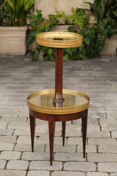 Table de dumbwaiter à étages avec galeries en laiton percées et miroir, France, années 1890