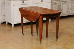 French 1890s Walnut Oval Drop Leaf Dining Table with Five Extension Leaves