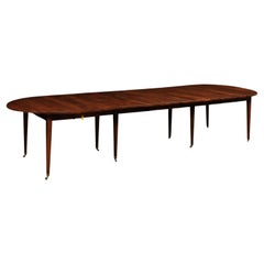 French 1890s Walnut Oval Extension Dining Table with Four Removable Leaves