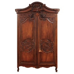 Antique French 1890s Walnut Wedding Armoire with Carved Doves, Quiver and Lutes