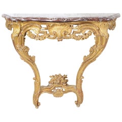 Table console française du XVIIIe siècle en bois doré sculpté et recouvert de marbre