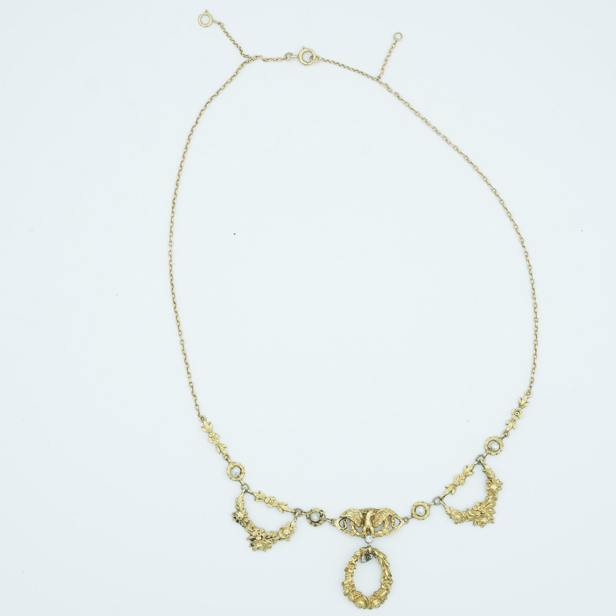 This French 18 Karat Art Nouveau necklace exemplifies the era's aesthetic with its organic and flowing design, incorporating stylized natural forms that are characteristic of the period which spanned from 1890 to 1910. The necklace features an