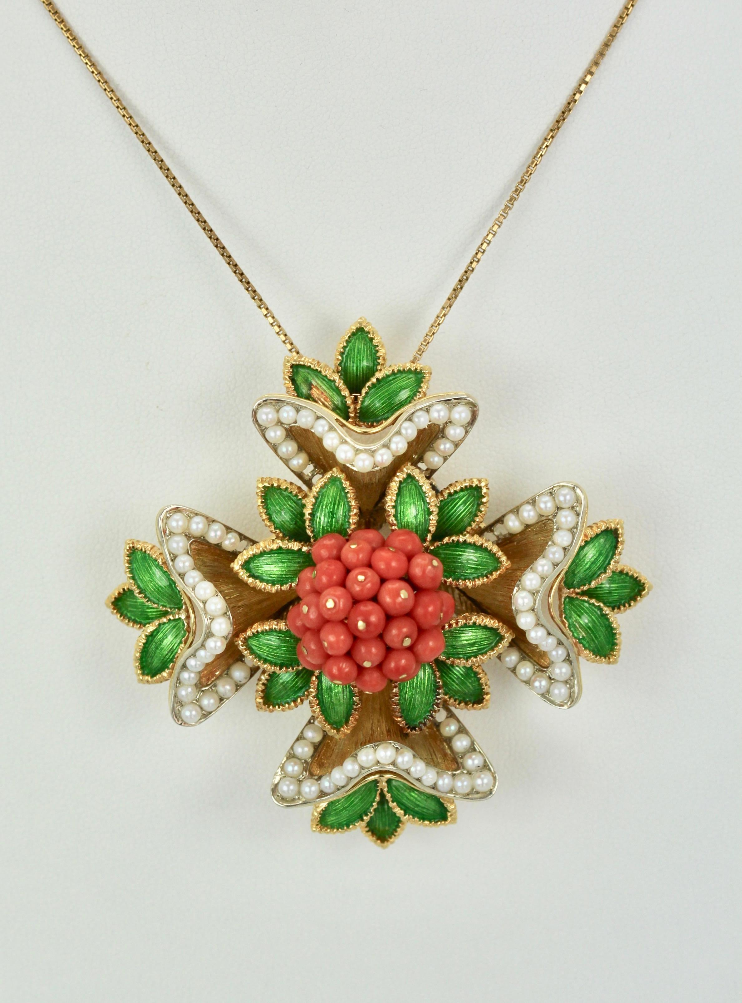 This extraordinary French Enamel Pearl Coral Maltese Cross Flower Brooch is remarkable.  The piece is done in 18k yellow Gold and features Coral beads and Seed Pearls all intact with Guilloche enamel in gorgeous green.  This brooch can be worn as a