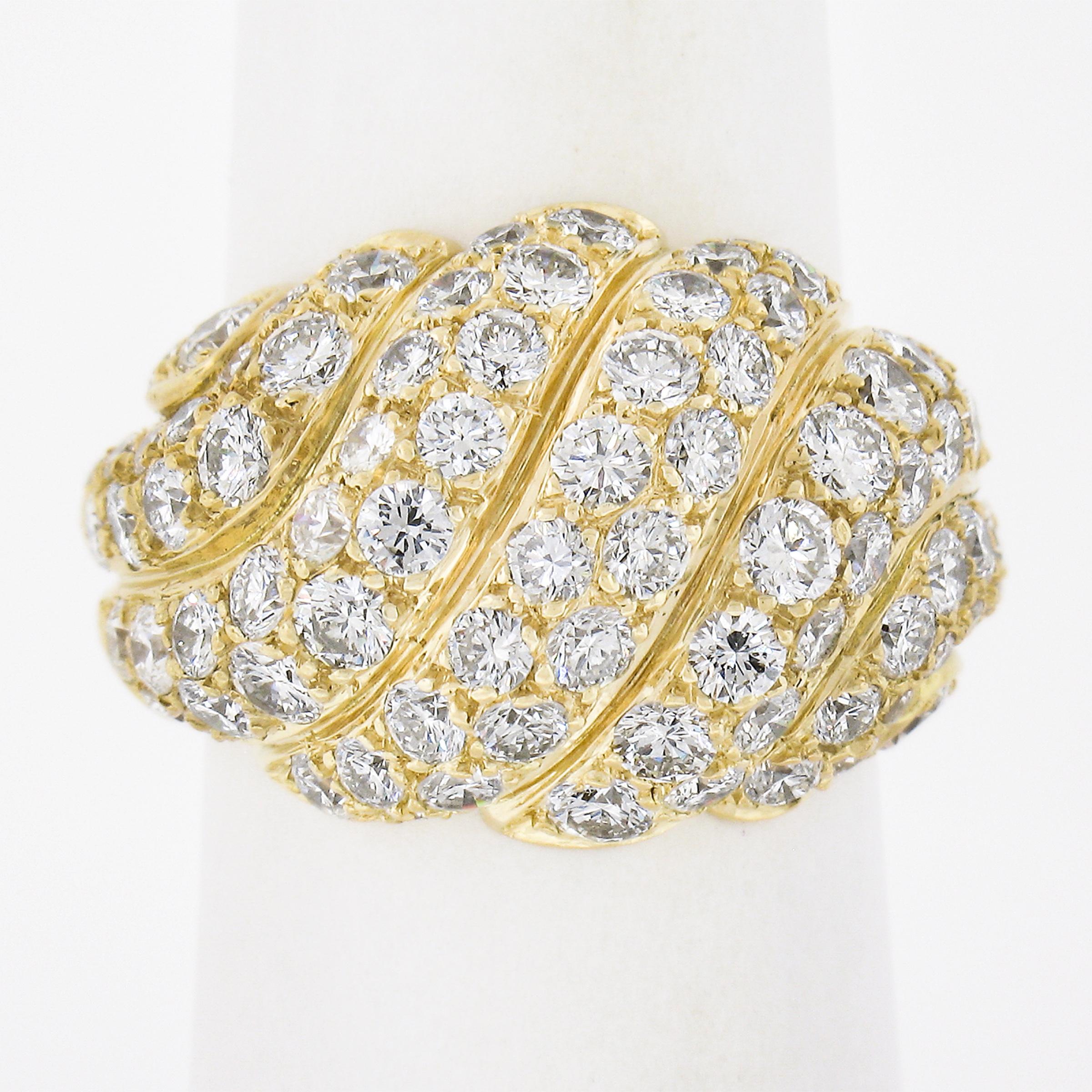 The French are truly perfectionists - This ring is no different. It is perfect! Perfect materials - solid luscious 18k yellow gold, colorless loupe clean ideal curt diamonds and magnificent design and workmanship to bring everything together! This