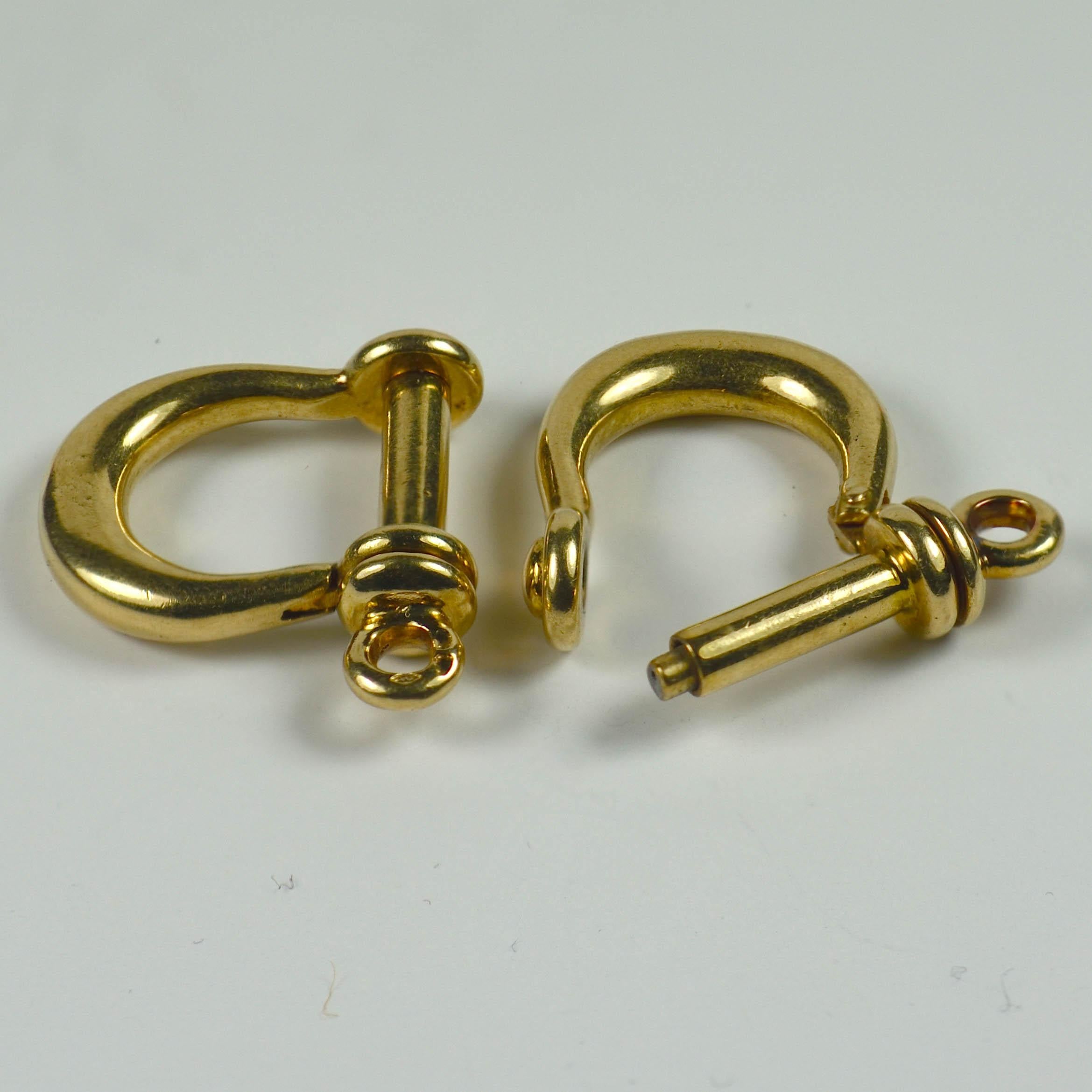 A fantastic pair of 18 karat gold cufflinks designed as boating shackles. Made by Gaetan De Percin, a jewellery maker used by Hermes and Tiffany. 
Stamped with French marks for 18k gold and De Percin.
Measurements: 0.75