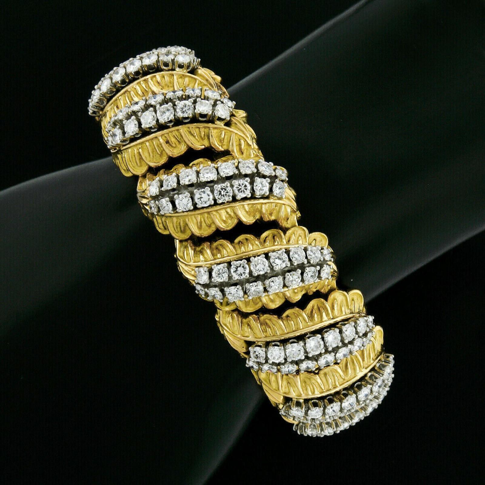 This very fine, vintage, cocktail statement piece was crafted from solid 18k gold and platinum. The bracelet is constructed from 18k gold, textured leaf links, topped by a twin row of solid platinum settings set with the finest quality diamonds