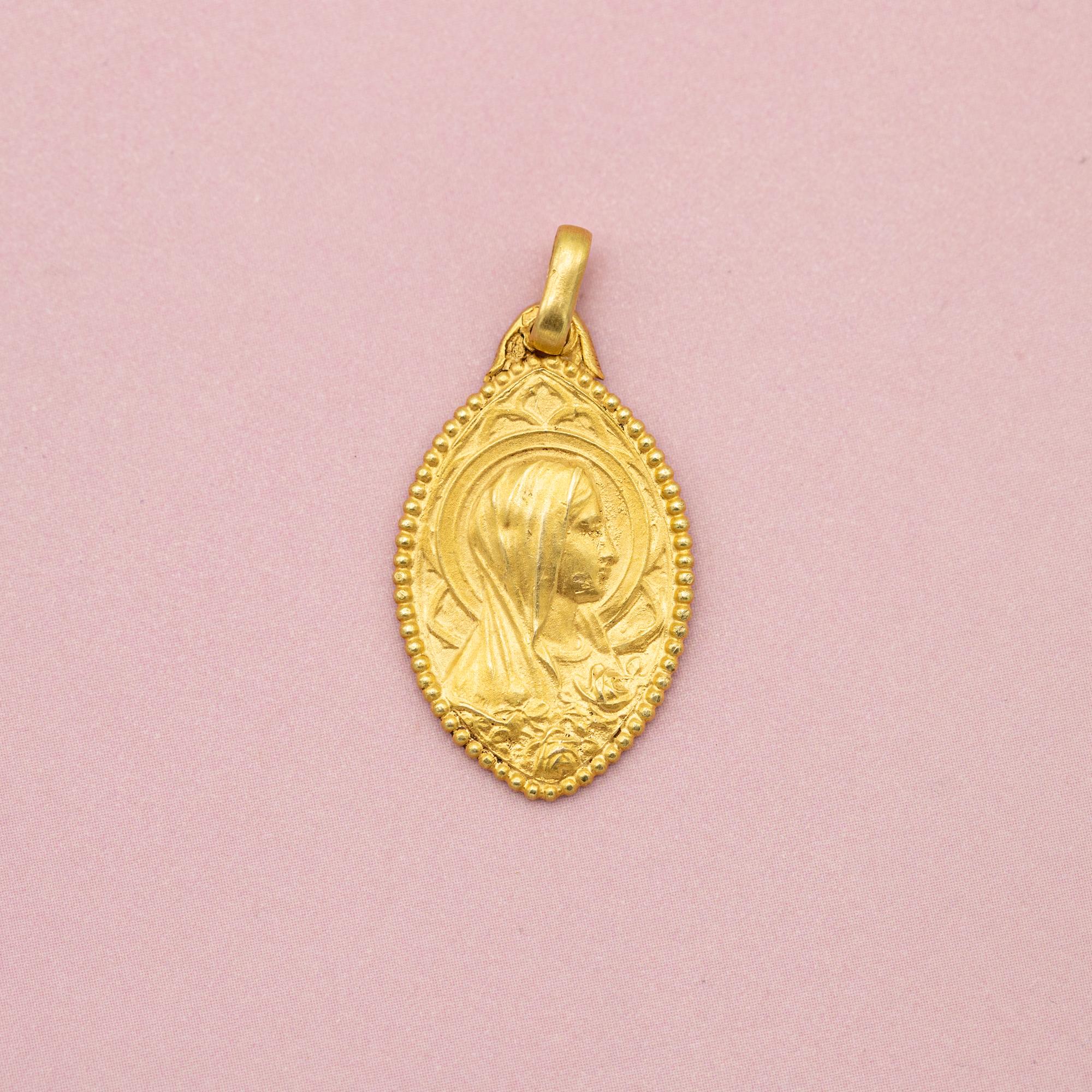 For sale is this stunning religious charm. This lovely charm depicts a well detailled Virgin Mary in front of an halo and stained glass. On the bottom of the charm we see roses, roses have long been connected with Virgin Mary. In the fifth century