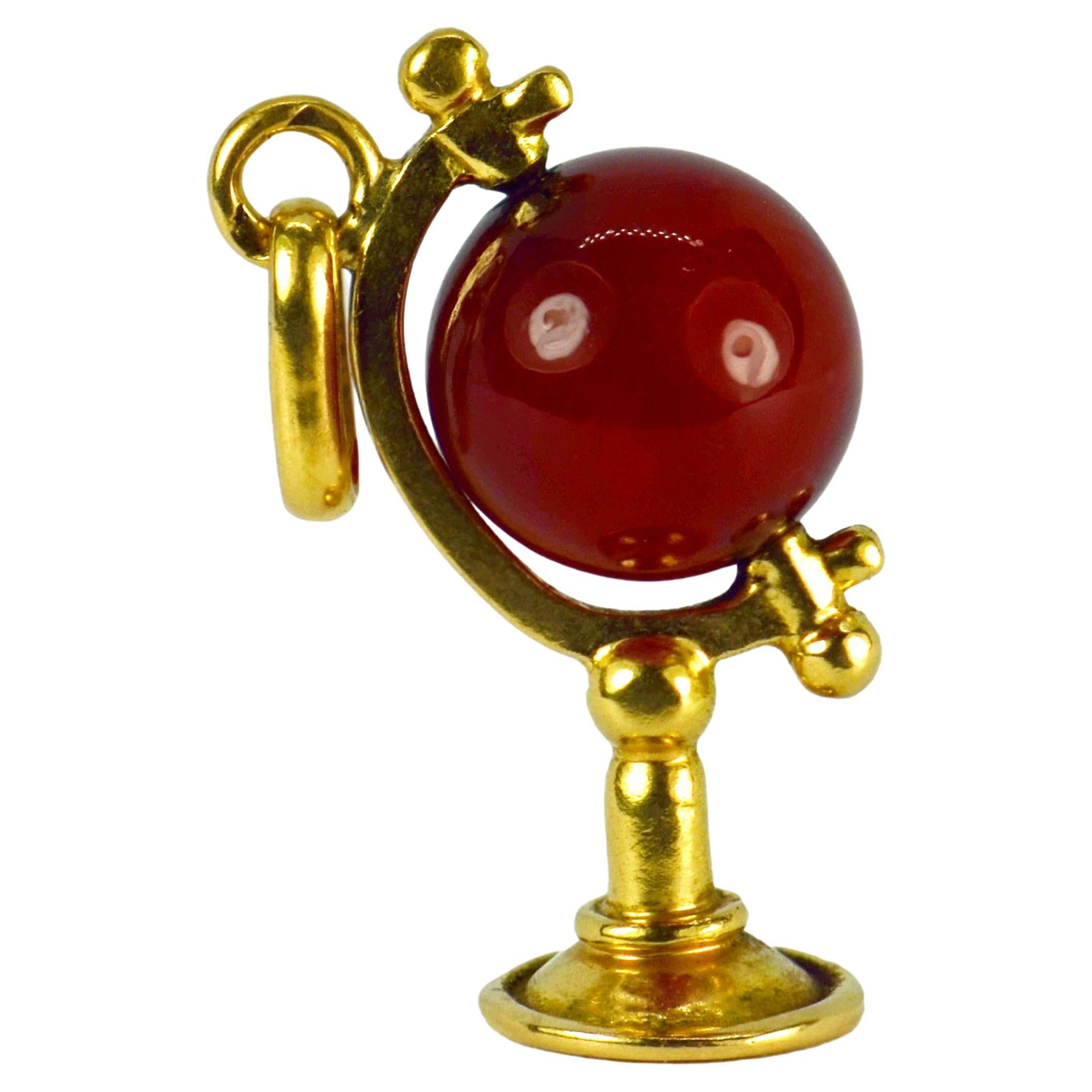 French 18K Yellow Gold Carnelian Spinning Globe Charm Pendant For Sale