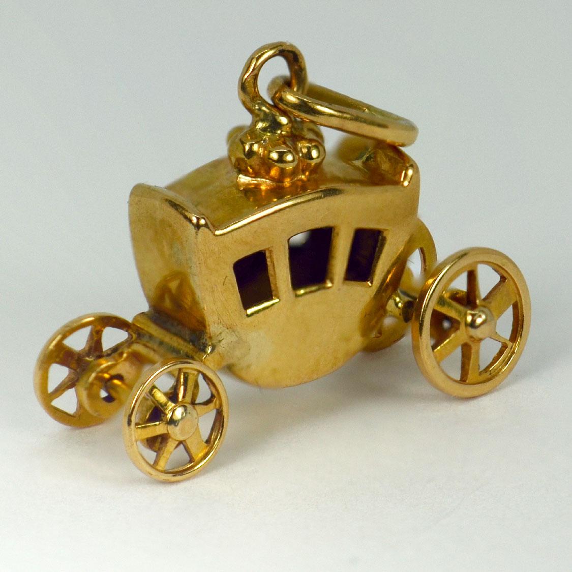 A French 18 karat (18K) yellow gold charm pendant designed as a carriage with moving wheels. Stamped with the eagles head for French manufacture and 18 karat gold with an unknown maker’s mark.

Dimensions: 1.5 x 1.8 x 0.7 cm (not including jump