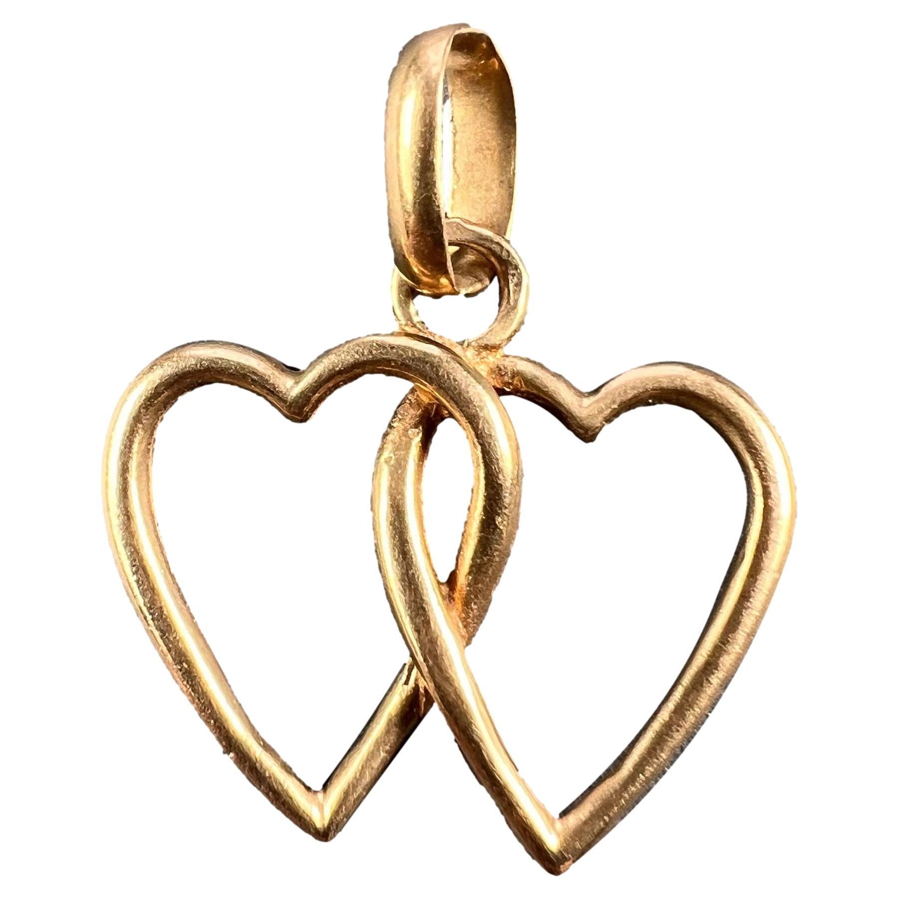 French 18k Yellow Gold Entwined Love Hearts Charm Pendant For Sale